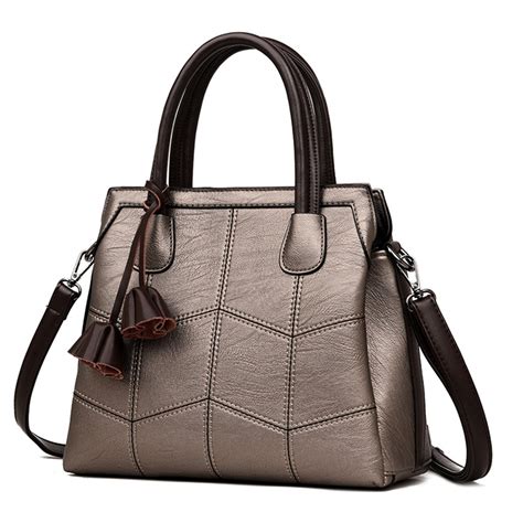 high end women's handbags|designer purses designed by women.